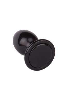 Crni Magnum plug masažer prostate u laminatu crna boja