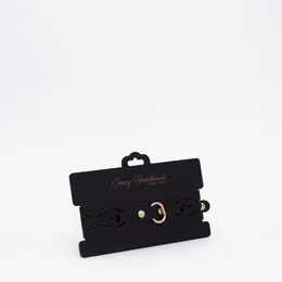 Crna kožna ogrlica sa zlatnim hardverom