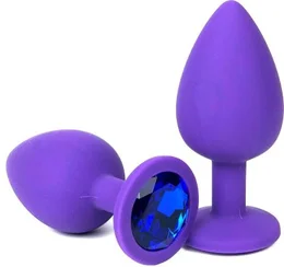 Analna čaura ljubičasta sa Medium kristalom plava 8 cm