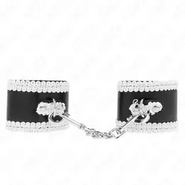 KINK Crne podesive lisice za ruke sa belom čipkom, 20-23 cm, elegantan dizajn