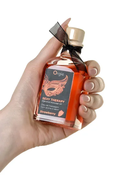 Orgie Lips masažni komplet za igre sa ukusom jagode (jestivo ulje, pero) 100ml