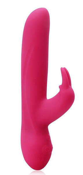 Ružičasti silikonski vibrator sa klitoralnim procesom i vibracionim režimima .