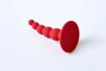 Analni čep Pulse, prečnik do 2,5 k 10 cm, boja bordo s