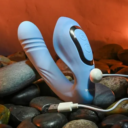 Evolved Tap and Thrust Light Blue intimni stimulator sa dva motora od silikona