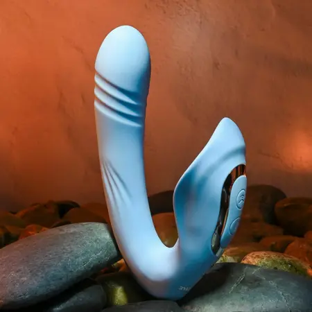 Evolved Tap and Thrust Light Blue intimni stimulator sa dva motora od silikona