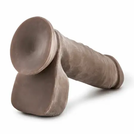 Blush Dr. Skin Mr. Magic realistični dildo od 23 cm sa vakuumskim postoljem u boji čokolade