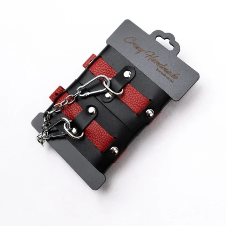 Lisice od crne kože sa crvenim kaišem