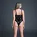 La Tentadora Vinyl & Mesh Teddy S crni, sjajni finiš i elegantan dizajn