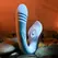 Evolved Tap and Thrust Light Blue intimni stimulator sa dva motora od silikona