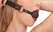 Bad Kitty Adjustable Black Silicone Gag with Plush Strap and Rose-Gold Accents